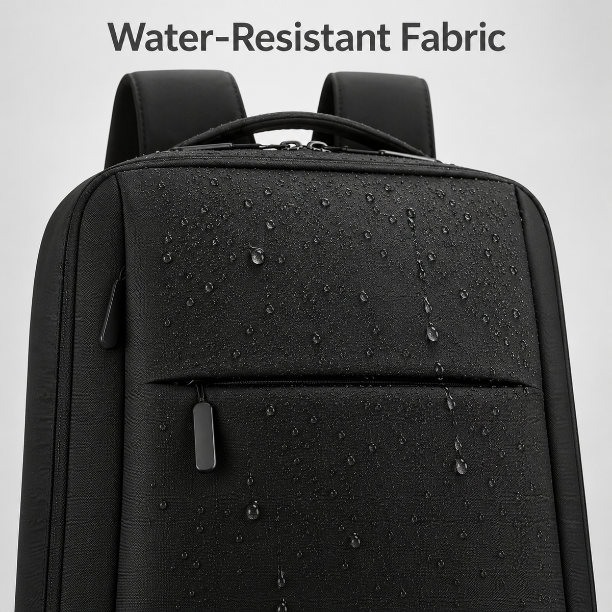 Black water-resistant laptop backpack 15.6 inch with USB port, fabric close-up